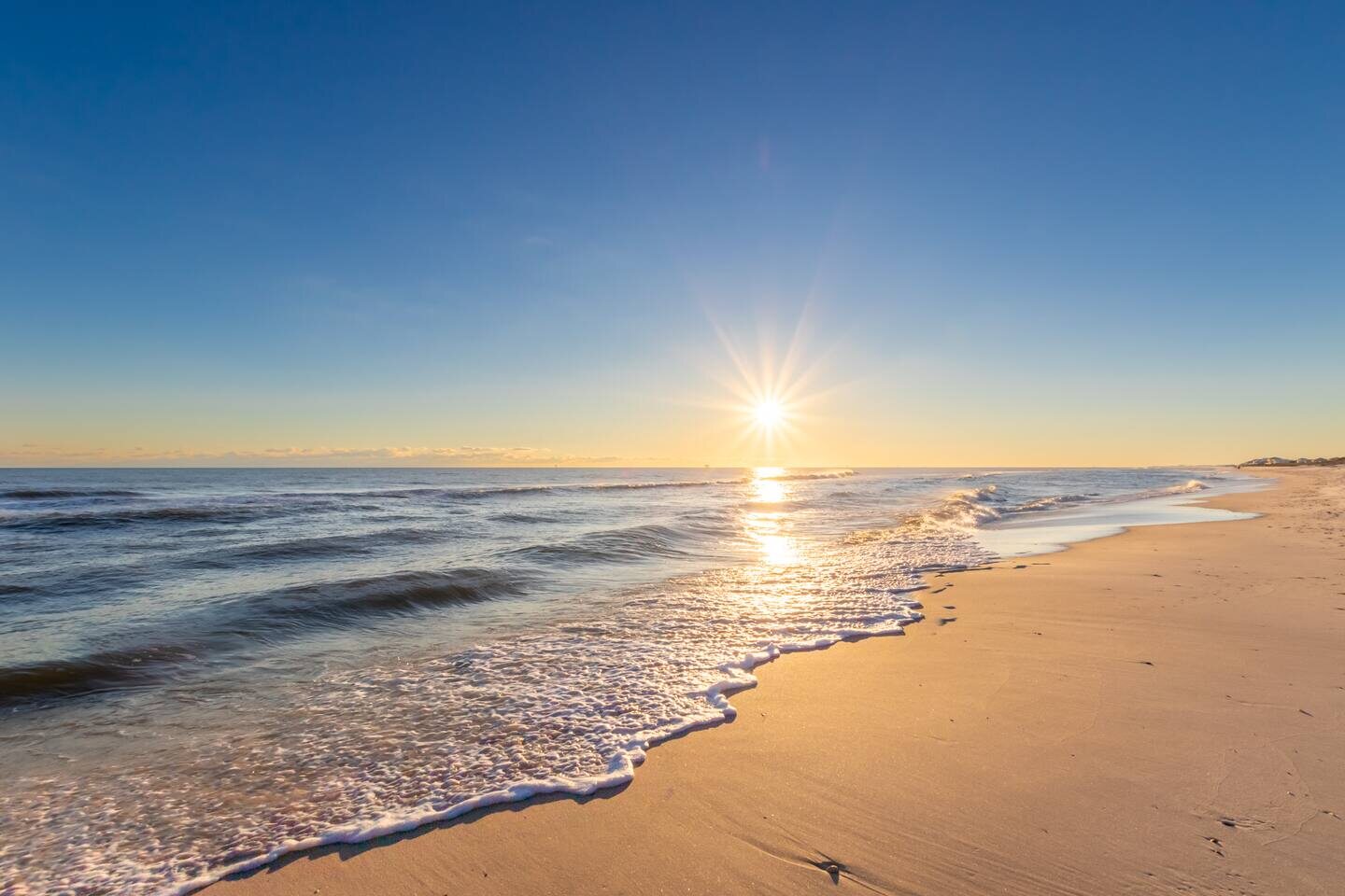 Sugar-white sand beach at The Seaside Suite in Fort Morgan, Alabama